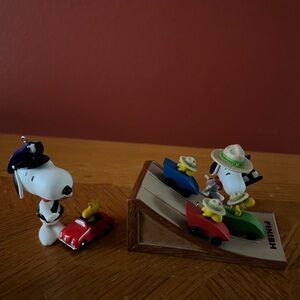 Snoopy Keepsake Ornaments.  Officer Snoopy and Race is on.